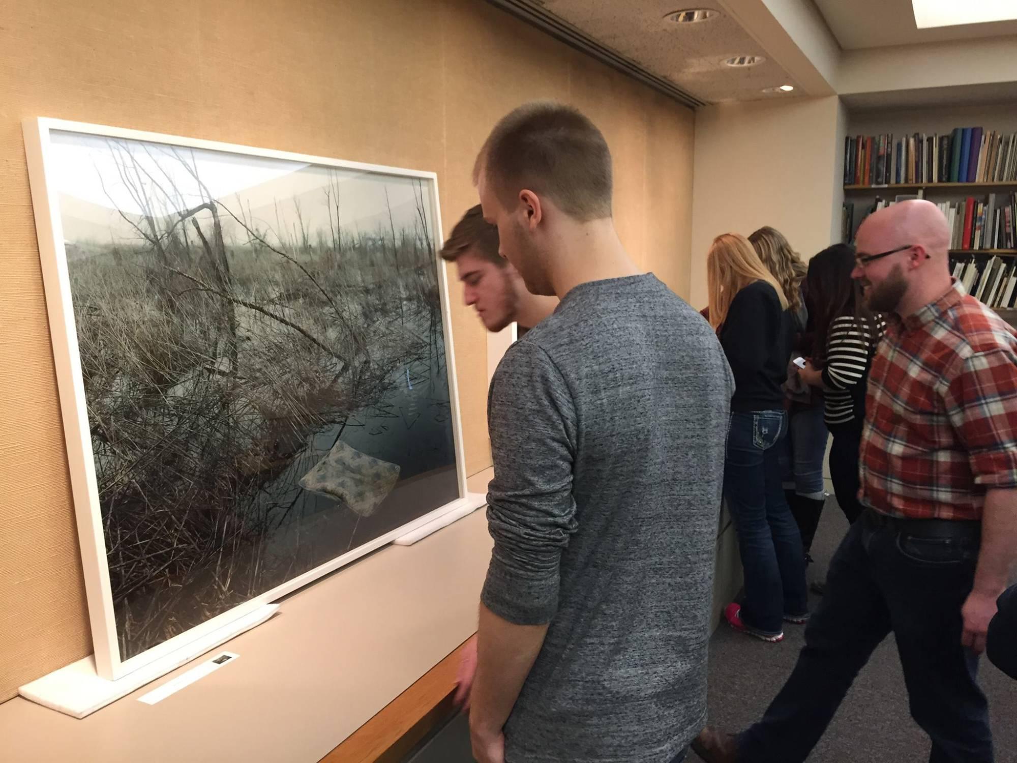 looking at original artwork at the Art Institute